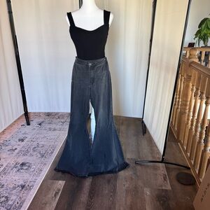 Free people black bell bottoms raw cut.